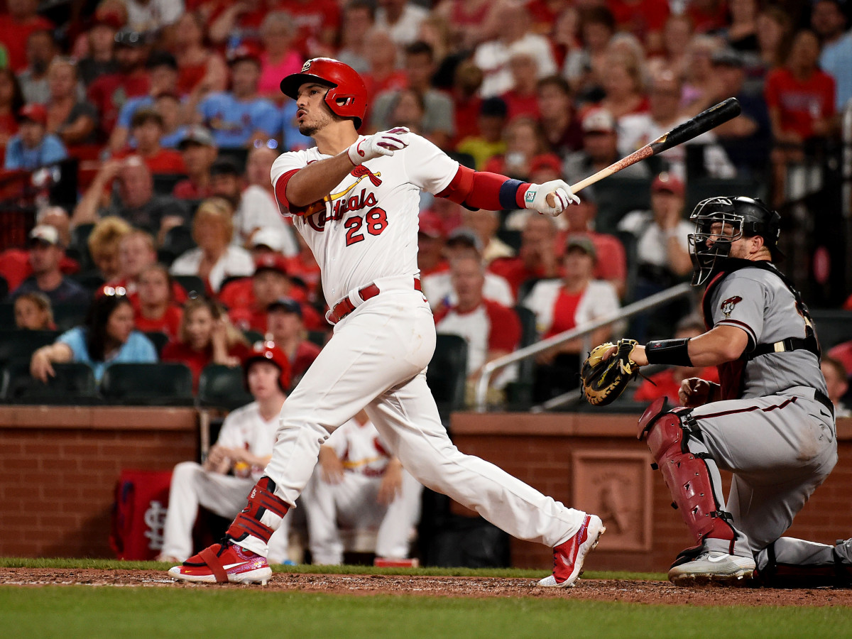 Jun 29, 2021; St. Louis, Missouri, USA; St. Louis Cardinals third baseman Nolan Arenado (28) hits a two run home run against the Arizona Diamondbacks during the fifth inning at Busch Stadium.